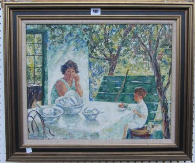 woman-and-child-at-a-garden-table