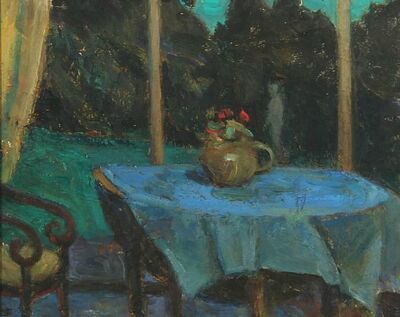 interior-with-flowers-on-a-blue-tablecloth